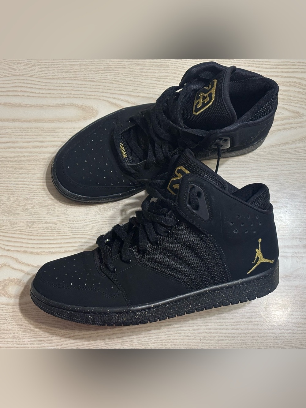 Jordan High Top Sneakers in Black with Gold Jumpman